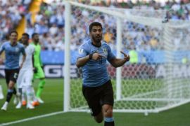 Piala Dunia - Rusia dan Uruguay lolos ke babak kedua
