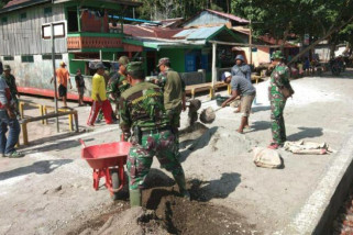 Satgas TMMD Kodim Yawa benahi jalan berlubang